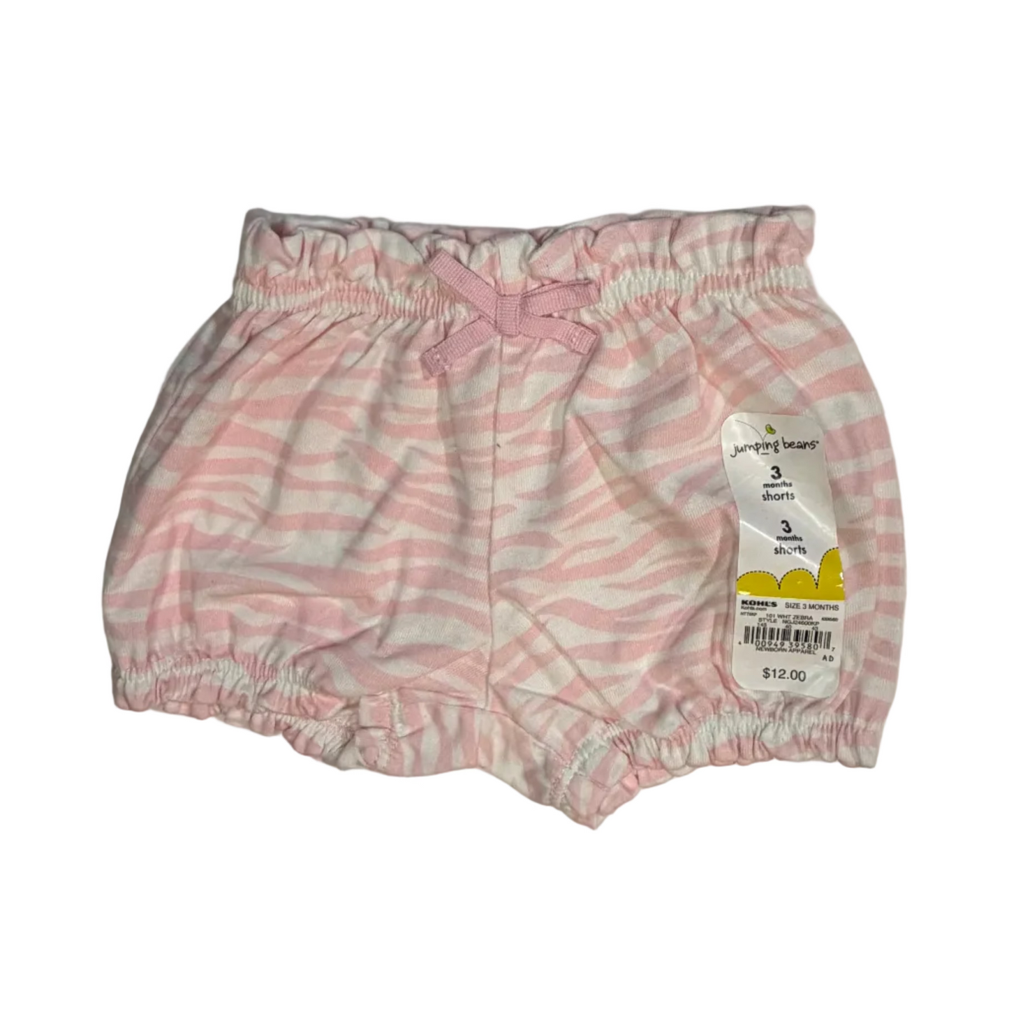 Pink and white striped baby bloomers with an elastic waistband and leg, featuring a hangtag, laid flat on a white fabric background.