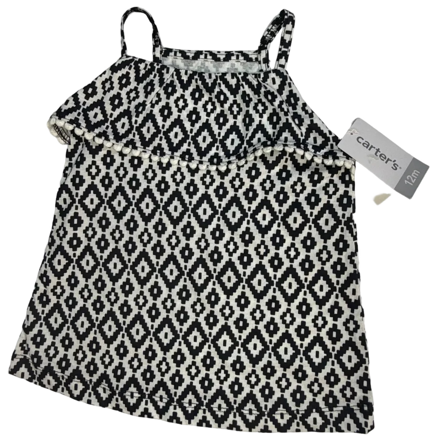 A Carter's brand black and white geometric patterned camisole top for kids, laid flat on a white background with its retail tag still attached.