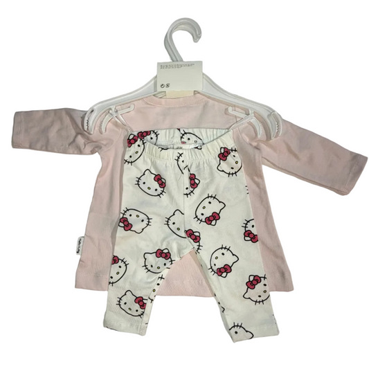 Baby long-sleeve romper set on a white hanger, featuring a white and pink Hello Kitty patterned front with a solid light pink back panel.