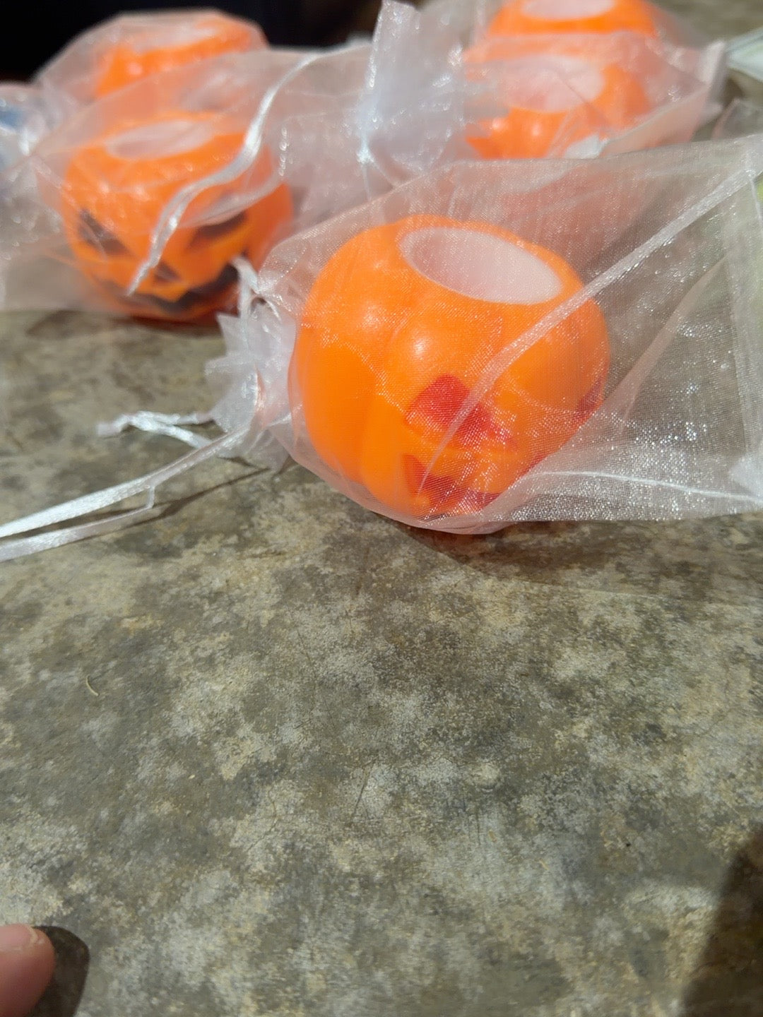 Orange Halloween jack-o-lantern pop up fidget toy in gift bag